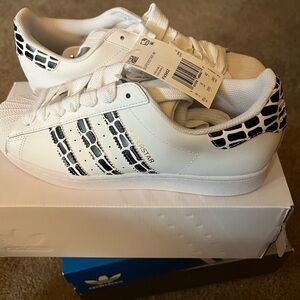 Adidas White Sneakers with Black Patterned Stripes